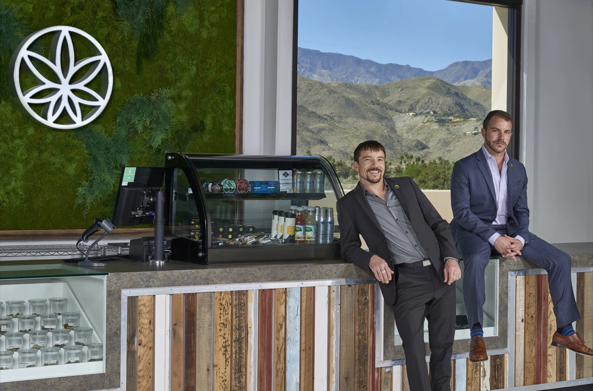 Commercial brand portrait — two business founders at their counter